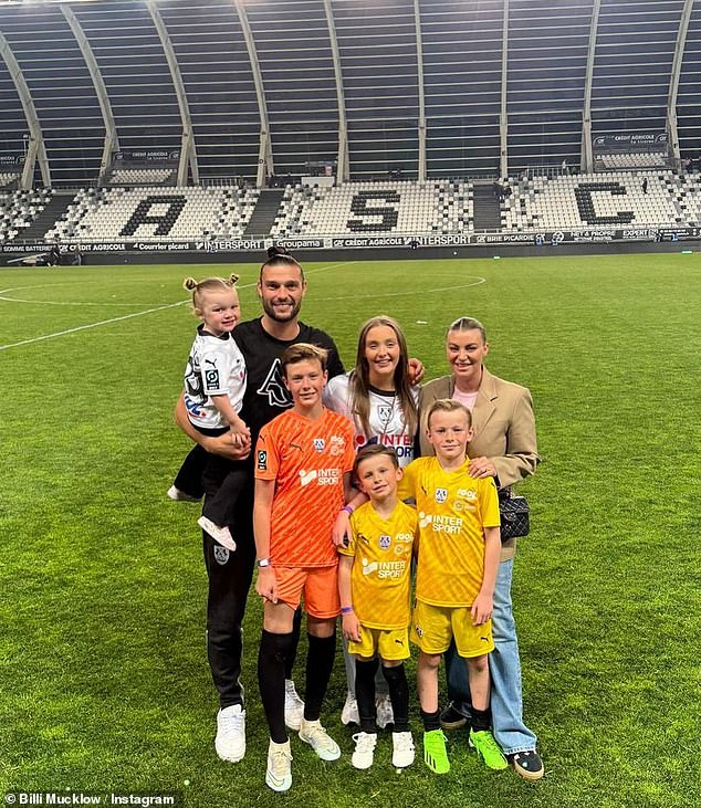 Andy and Billi have three children together - Arlo, 10, Wolf, eight, and Marvel Mae, five, and she also raises his children Emilie Rose, 15, and Lucas, 14 from his past relationship (pictured all together)