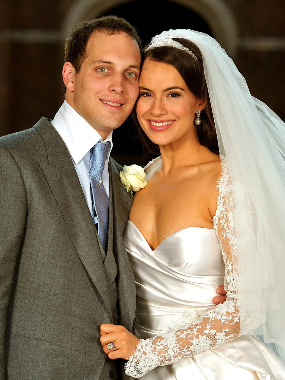 Sophie Winkleman smiling on her wedding day with the groom.