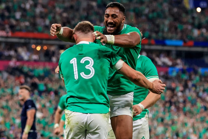 Ireland's Garry Ringrose and Bundee Aki celebrate a try against Scotland in the Pool B fixture at the 2023 Rugby World Cup in France. Photograph: Dan Sheridan/Inpho