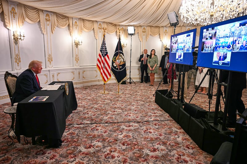 Trump participates in a call with military service members from his Mar-a-Lago residence in Palm Beach, Florida, during the Thanksgiving holiday. Photograph: Jim Watson/AFP via Getty Images