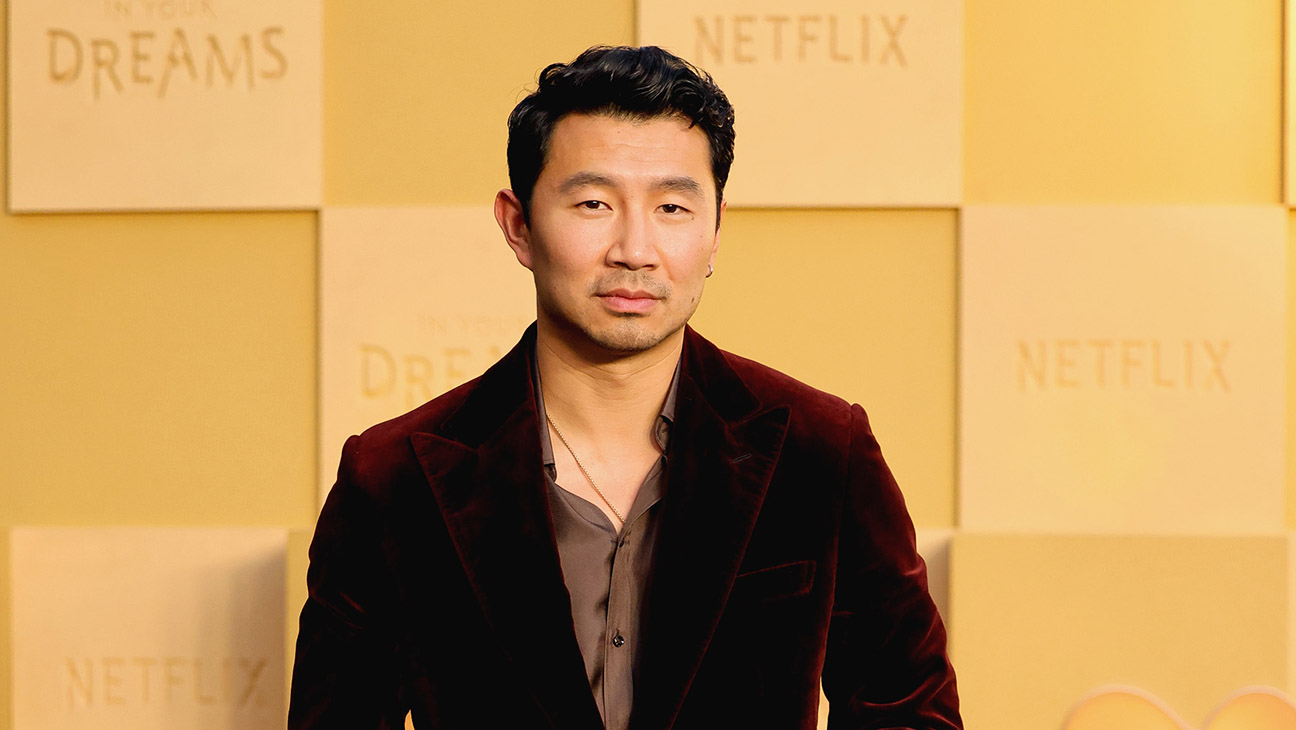 Simu Liu attends the world premiere of Netflix's In Your Dreams at the Egyptian Theatre Hollywood on October 28, 2025 in Los Angeles, California.