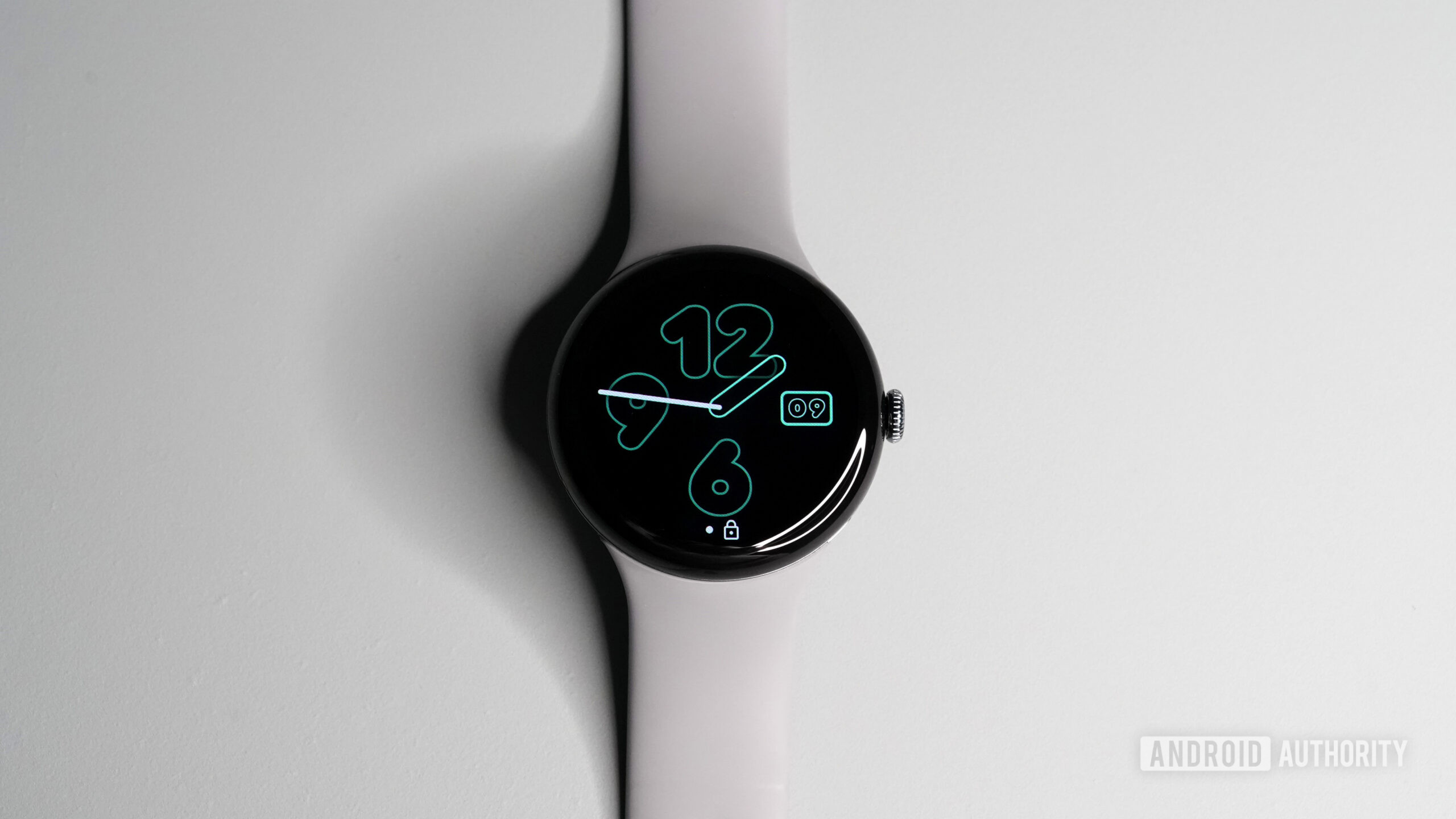 A Google Pixel Watch 3 displays its watch face.
