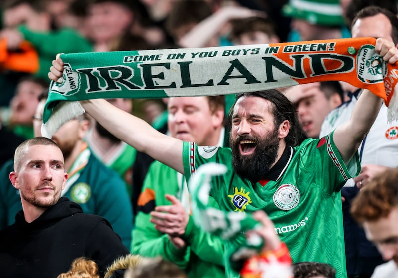 Fans celebrate Ireland's defeat of Portugal in the Aviva Stadium on Thursday. Photograph: Ryan Byrne/Inpho