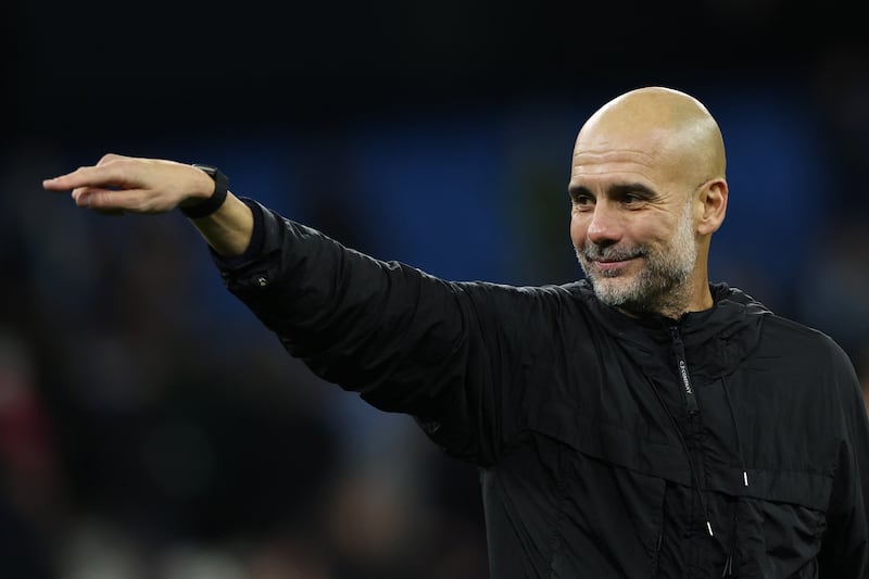 Pep Guardiola acknowledges Manchester City supporters at the end of the match against Liverpool. Photograph: Darren Staples/Getty