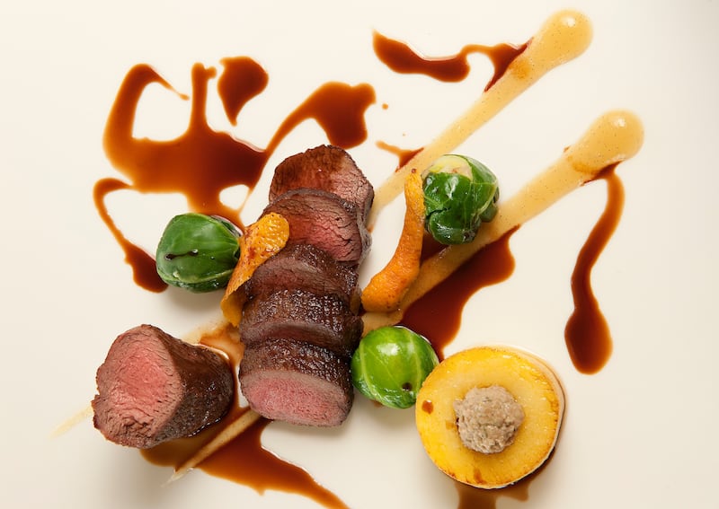 Wild loin of Irish venison, pear and vanilla puree, truffled cabbage,
smoked bacon, potato and chestnut fondant, chocolate and Port syrup from Seamus Commons, Knockranny House Hotel