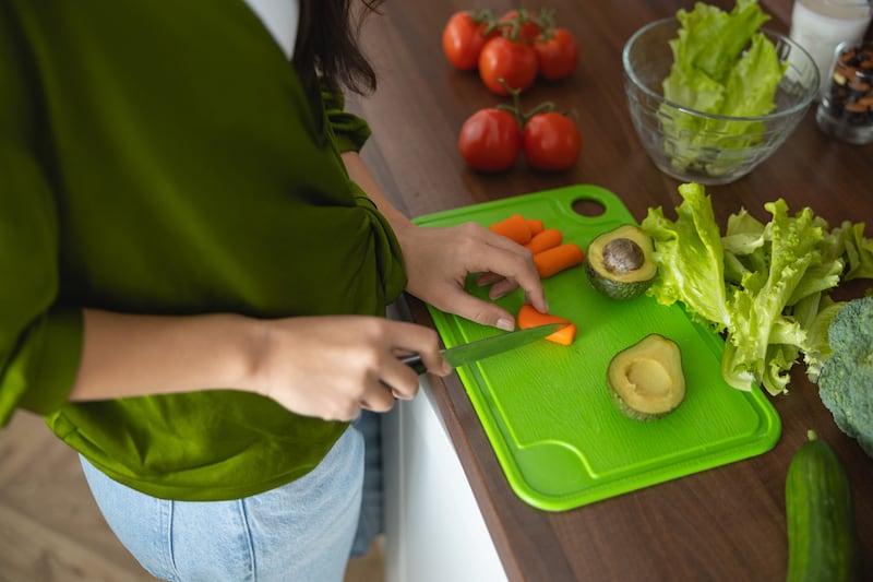 The chopping action is releasing tiny plastic shards from the board on to our food - if you're using a plastic chopping board. Photograph: Getty Images
