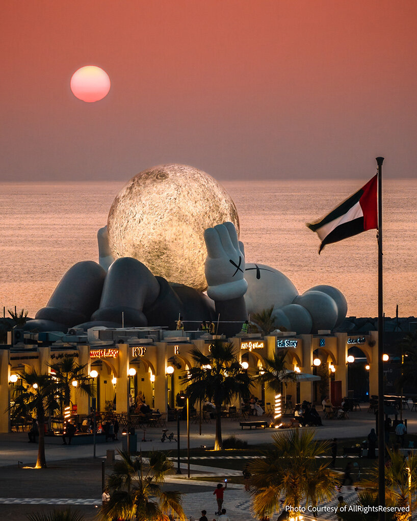 32-meter companion by KAWS lifts glowing moon along abu dhabi's waterfront