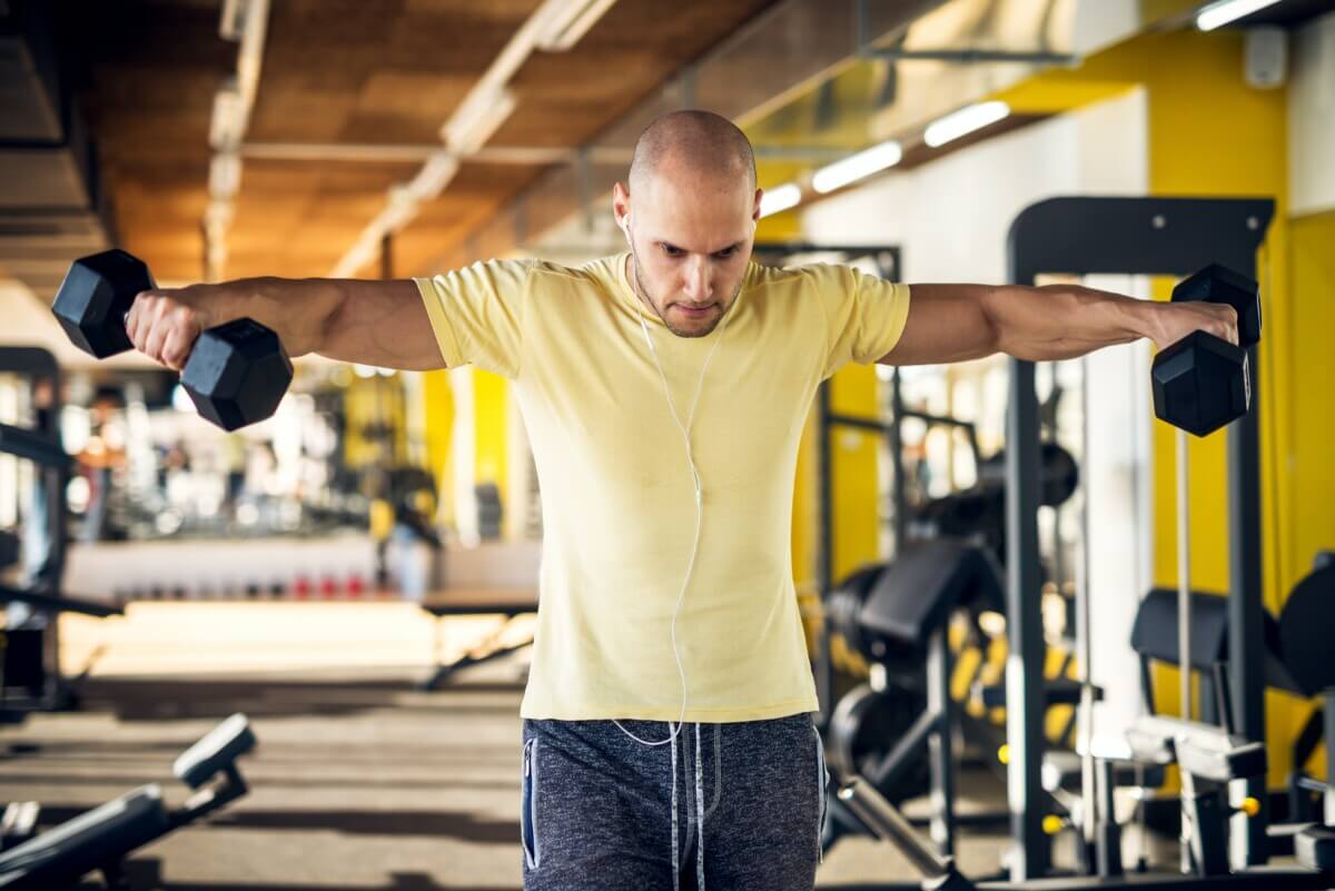 Man lifting dumbbell