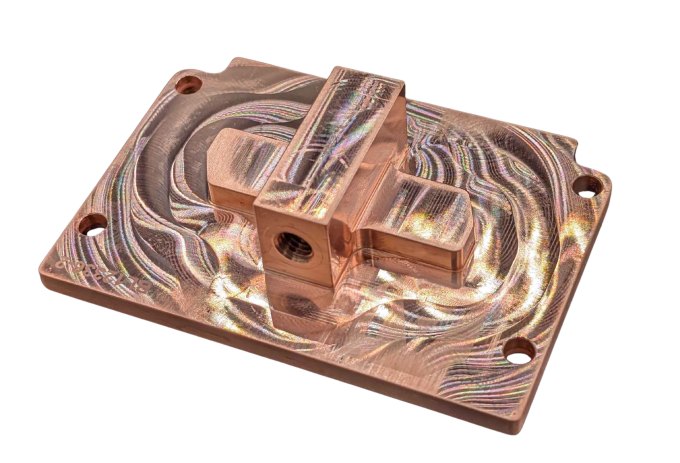 A copper cooling plate is shown against a white background.