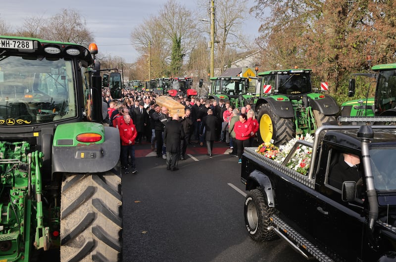 Members of Droim Conrach GAA Club provide a guard of honor after the funeral of Alan McCluskey, one of the five young people killed in a Co Louth road crash last Saturday. Photograph: Alan Betson