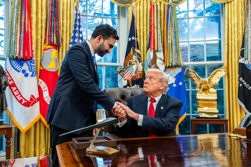 President Donald Trump shakes hands with New York mayor-elect Zohran Mamdani as they speak to reporters in the Oval Office of the White House. Photograph: Eric Lee/The New York Times
                      