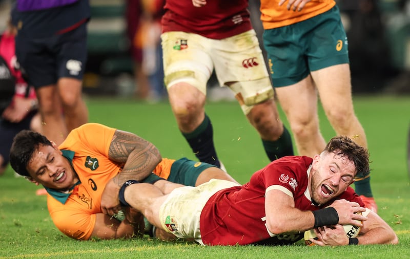 Hugo Keenan scores a try for the Lions against Australia. Photograph: Tom Maher/Inpho