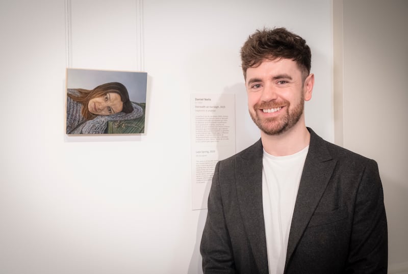 Daniel Nelis with his portrait of his wife, titled Late Spring. Photograph: Niamh Barry