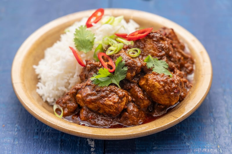Pork vindaloo with steamed rice