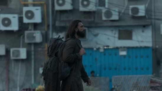 Ranveer Singh's character walking in Lyari in a still from Dhurandhar.