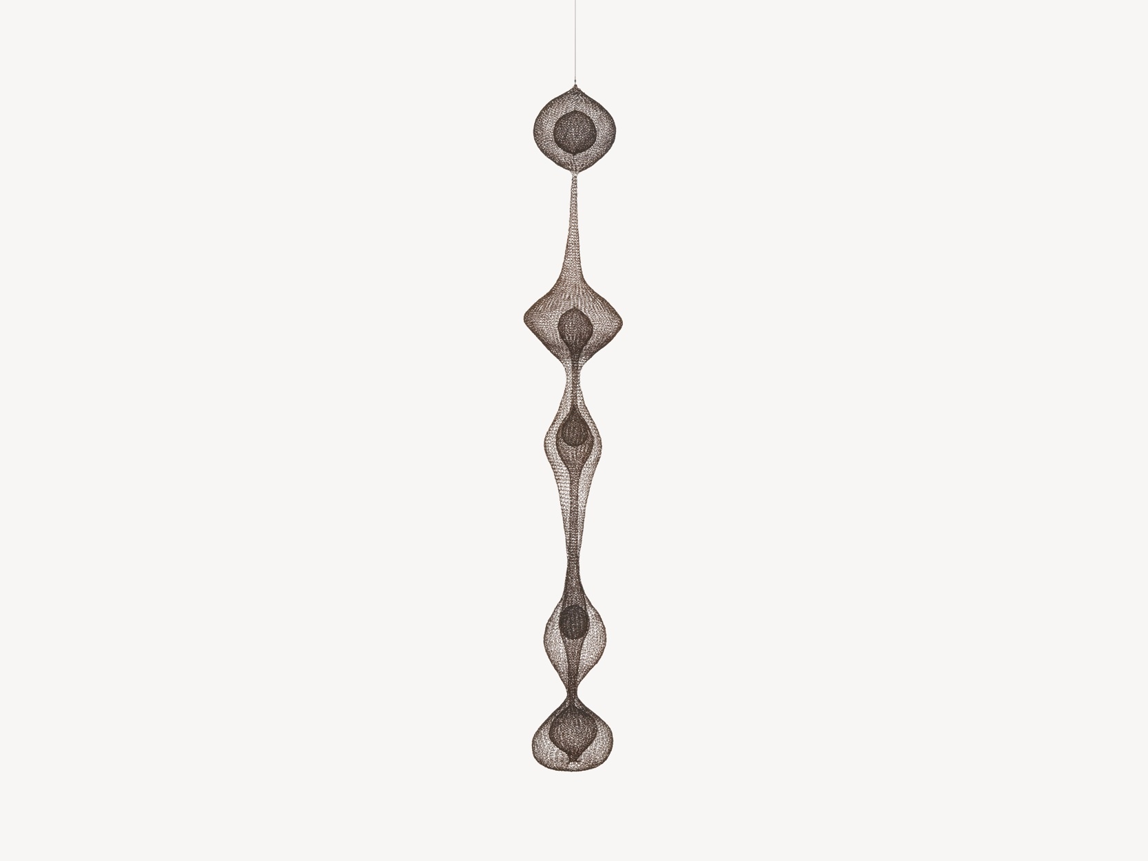 “Untitled” (S.535, Hanging Five-Lobed Continuous Form within a Form with Spheres in the First and Fourth Lobes and a Teardrop Form in the Third Lobe), 1951. Iron and brass wire. Private collection.