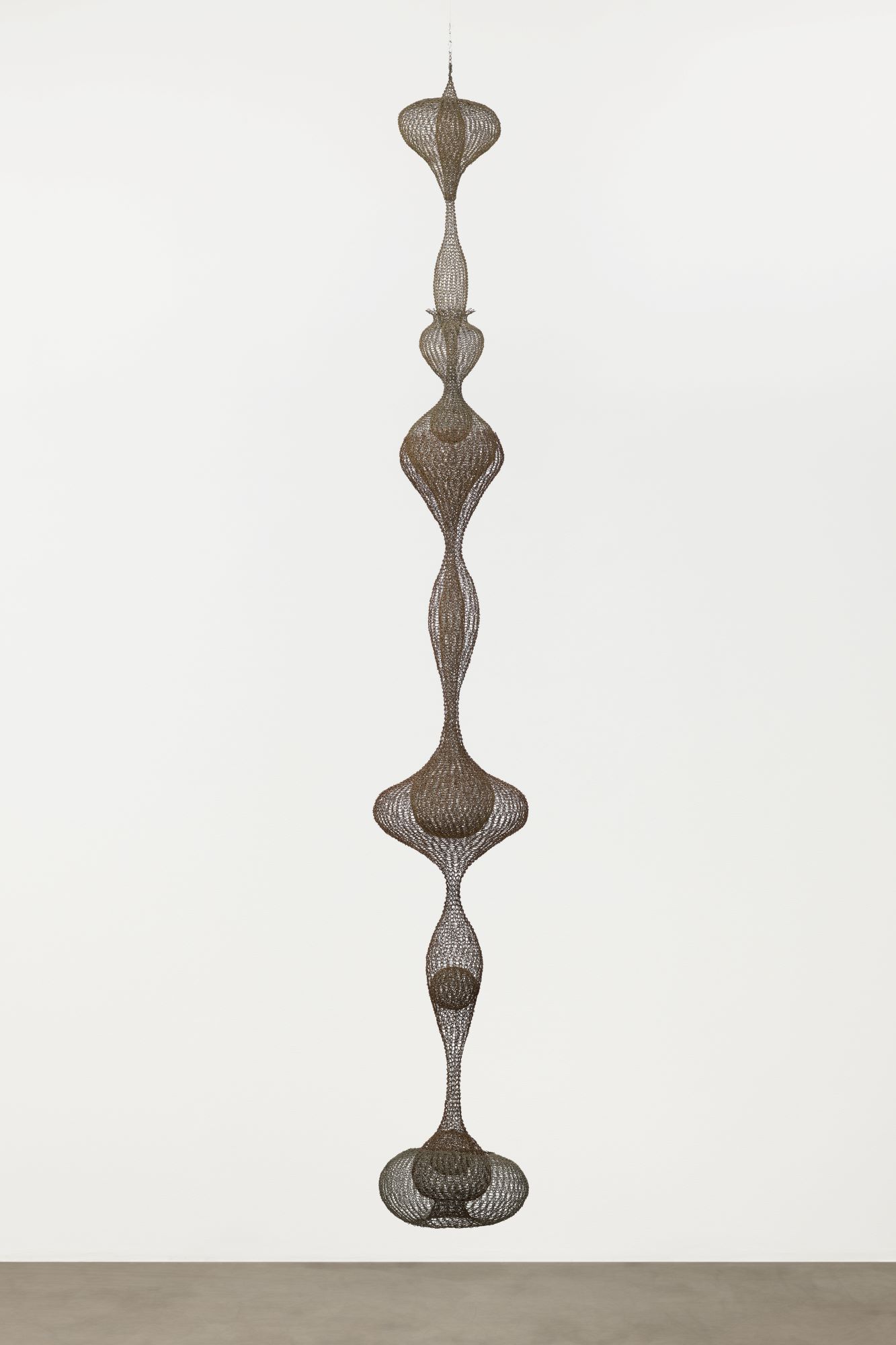 “Untitled” (S.398, Hanging Eight-Lobed, Four-Part, Discontinuous Surface Form within a Form with Spheres in the Seventh and Eighth Lobes), c. 1955. Brass wire, iron wire, and galvanized iron wire. The Museum of Modern Art, Promised gift of Alice and Tom Tisch, 2016.