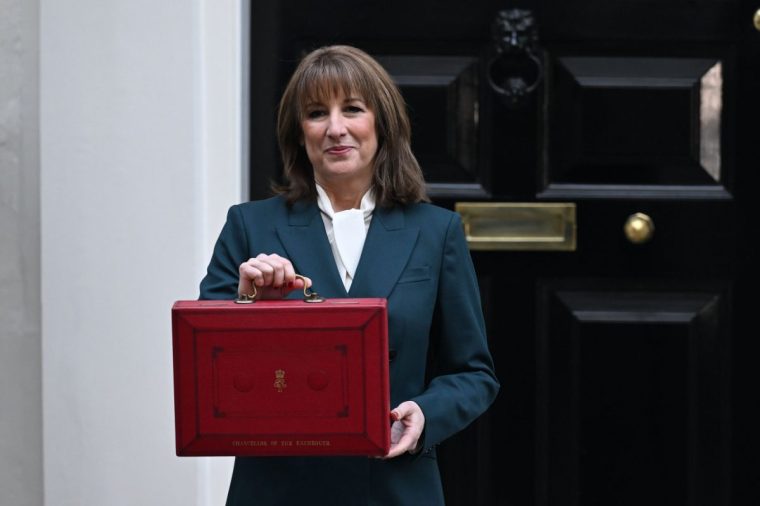 LONDON, UNITED KINGDOM - NOVEMBER 26: Chancellor of the Exchequer Rachel Reeves leaves 11 Downing Street with traditional red box ahead of revealing Labour government's budget in House of Commons in London, United Kingdom on November 26 2024. (Photo by Rasid Necati Aslim/Anadolu via Getty Images)