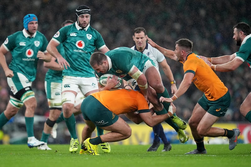 Ireland's Stuart McCloskey is tackled. Photograph: Brian Lawless/PA
