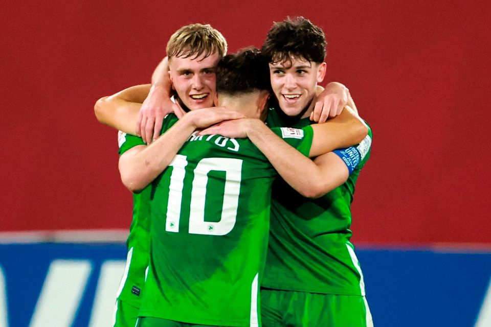 Ireland players, from left, Michael Noonan, Ramon Martos and Rory Finneran celebrate after the Under-17 World Cup Group J win over Uzbekistan at Aspire Zone in Doha, Qatar. Photo: Nikola Krstic/Sportsfile