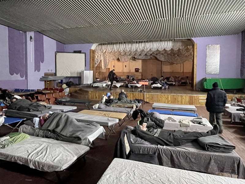 A concert hall in a cultural centre in Pavlohrad now serves as a shelter for people displaced by Russia's invasion. Photograph: Dan McLaughlin