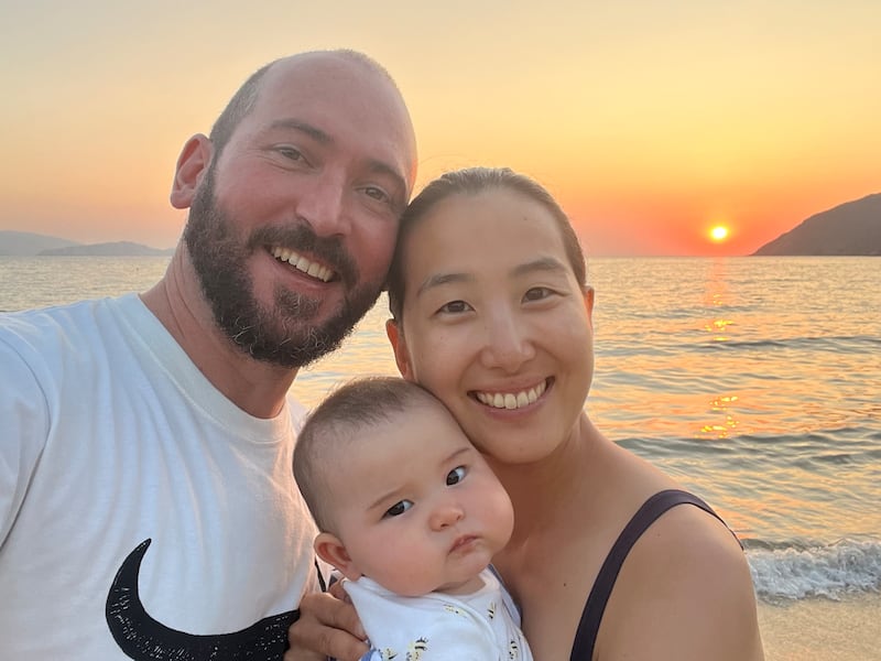 David Desmond and his wife, Shoko Fujita, with their daughter, Emiko