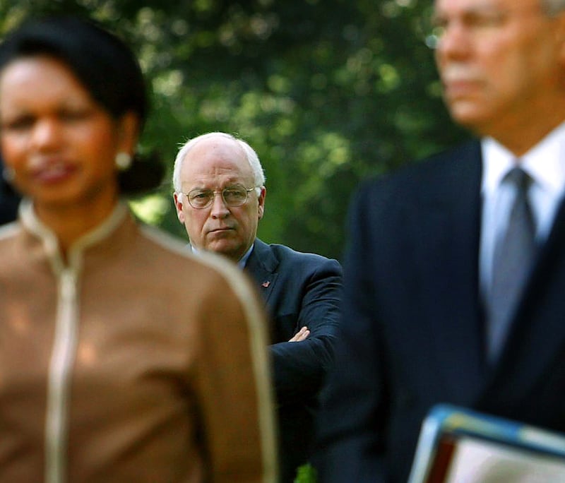 Dick Cheney behind then US national security advisor Condoleezza Rice and secretary of state Colin Powell in 2004. Photograph: Doug Mills/The New York Times
                      