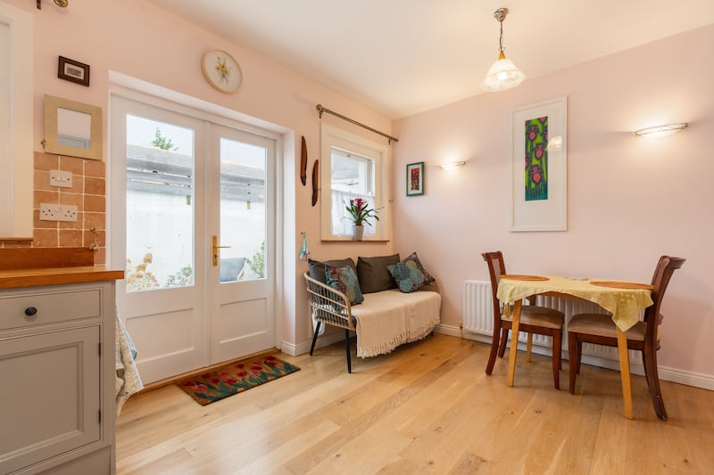 The property opens to a courtyard from the eat-in kitchen