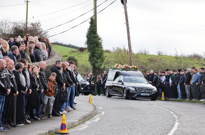 Mourners line the streets as Shay Duffy's remains are brought to St Patrick's Church, Rockchapel, Co Monaghan, for his funeral. Photograph: Dara Mac Dónaill 
