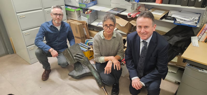 Artist Daniela Balmaverde with SDLP councillor Gary McKeown (left) and Libraries NI chief executive Jim O'Hagan