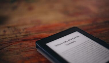Amazon Kindle e-reader laying on a wooden surface
