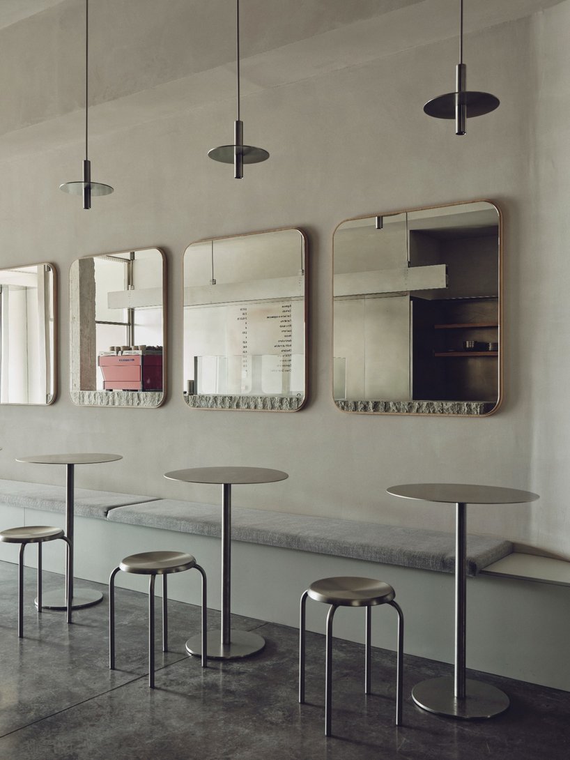 café's curved interiors by zooco estudio reflect art deco siboney building in spain