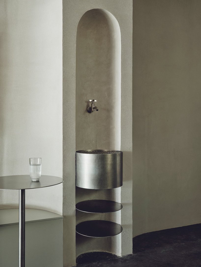 café's curved interiors by zooco estudio reflect art deco siboney building in spain