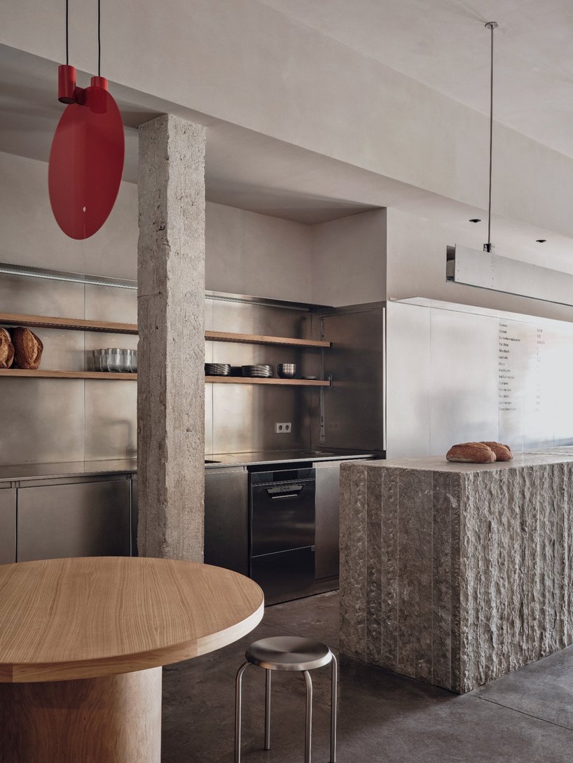 café's curved interiors by zooco estudio reflect art deco siboney building in spain