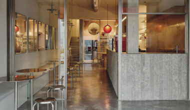 café's curved interiors by zooco estudio reflect art deco siboney building in spain