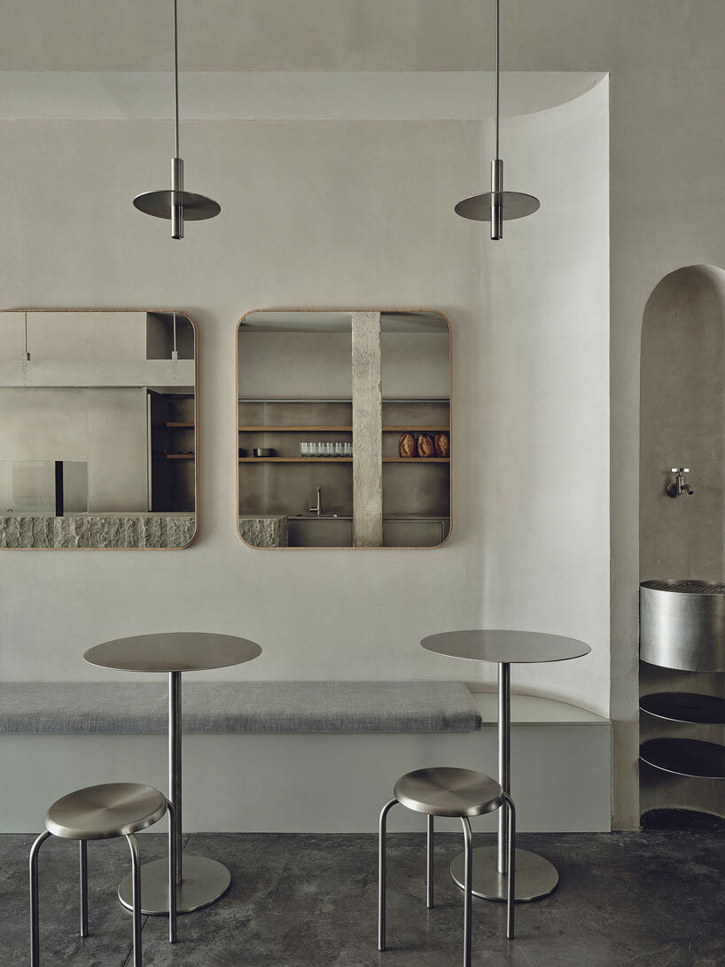 café's curved interiors by zooco estudio reflect art deco siboney building in spain