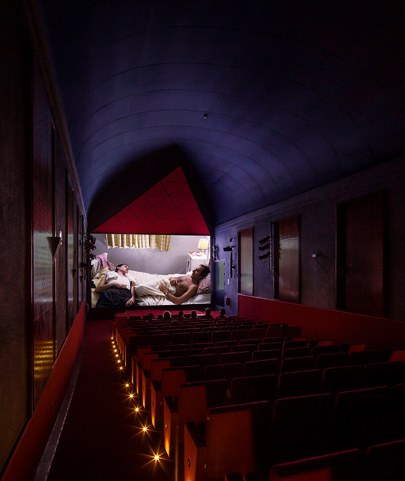 BACH converts reina sofía's auditorium into red-velvet cinema beneath blue vault in madrid