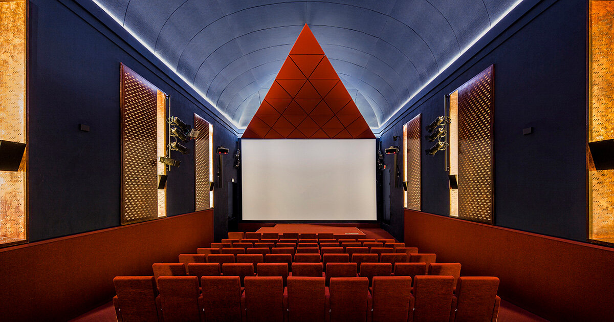 BACH converts historic auditorium into red-velvet cinema in madrid