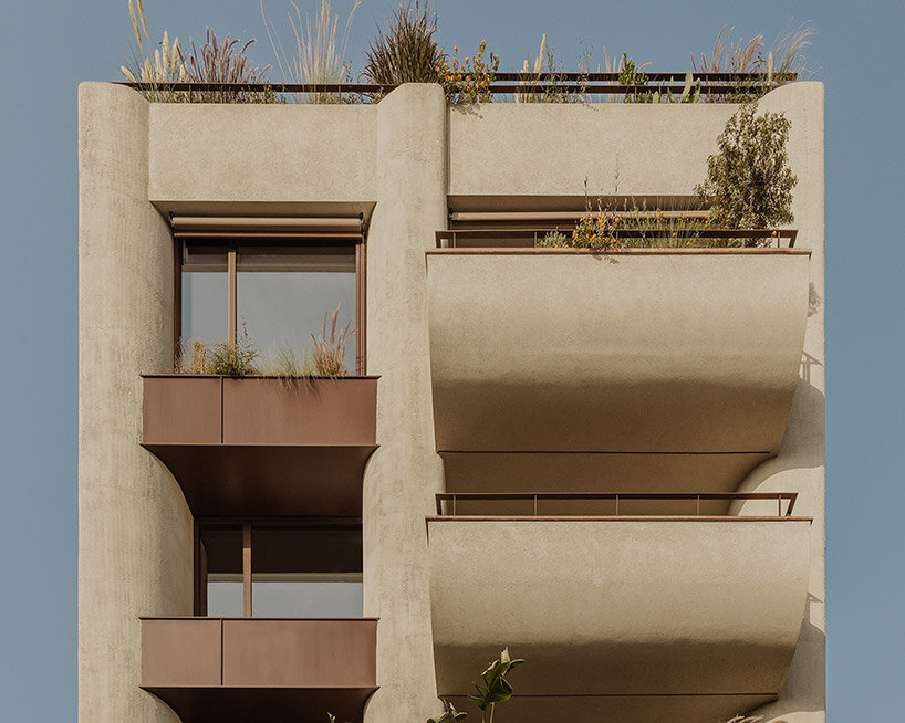 block722 crowns athens apartment building with light-filled duplex home for its founders