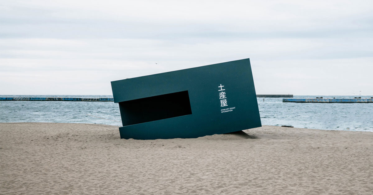 buried souvenir shop on japanese shoreline reflects on tourism, land, and memory