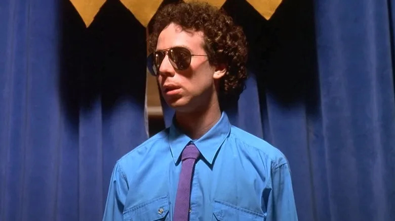 Kevin Sussman as Steve in a suit and sunglasses in "Wet Hot American Summer" (2001)