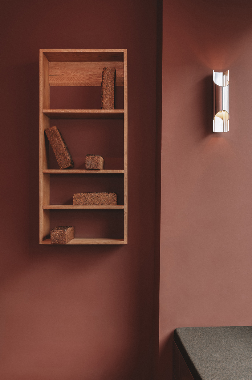 common integrates microbakery and pizzeria within flexible hybrid interior in berlin