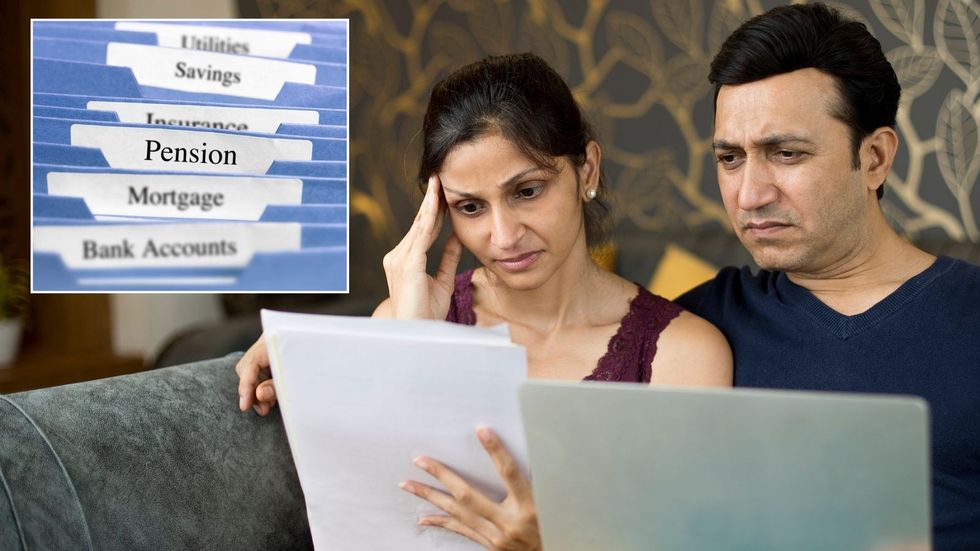 Couple looking at pension documents