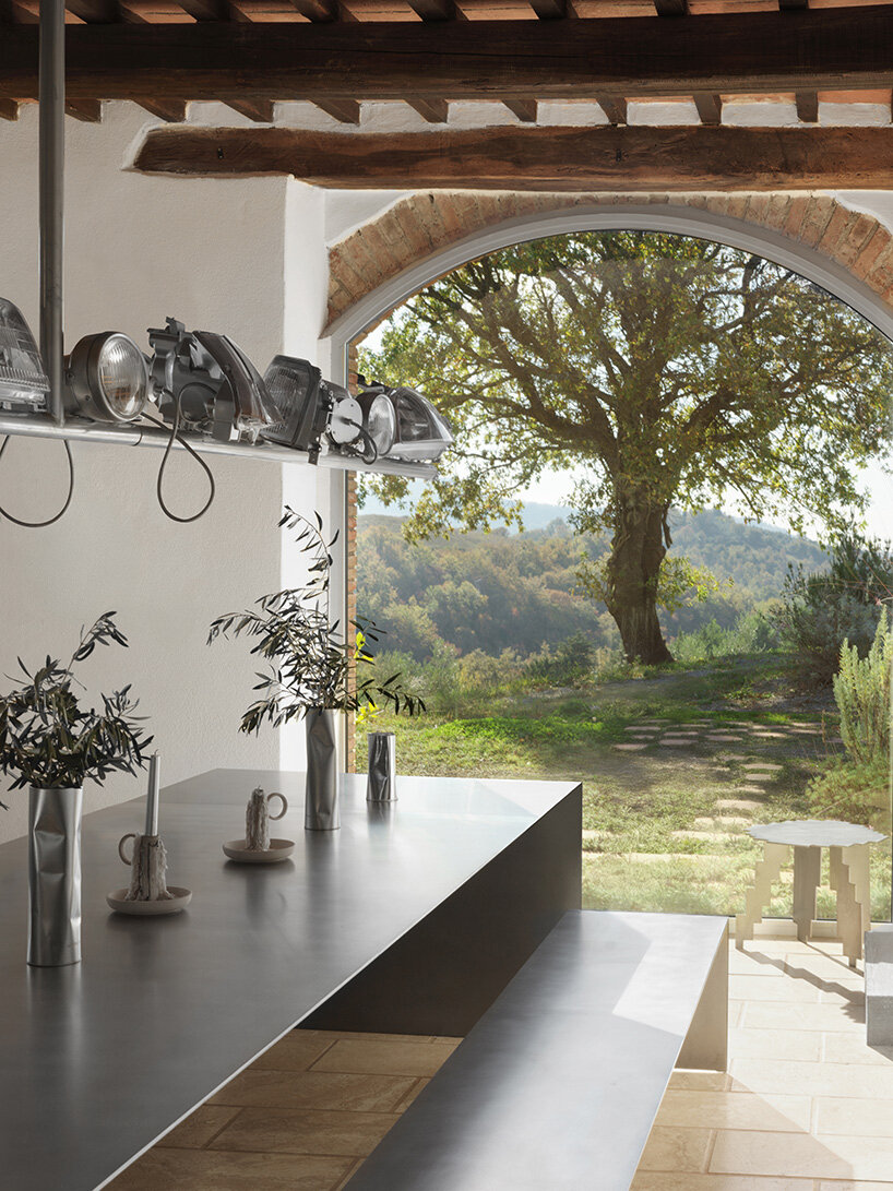 crosby studios restores 17th-century tuscan farmhouse with metallic and sculptural details