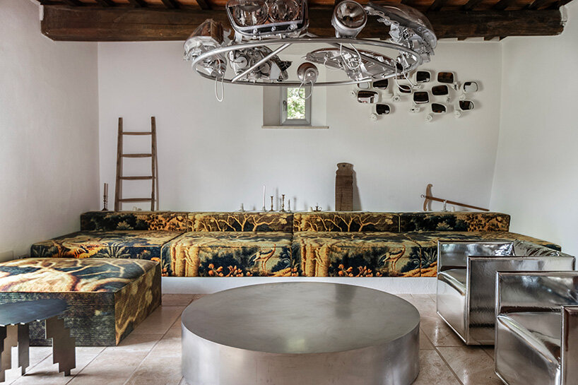 crosby studios restores 17th-century tuscan farmhouse with metallic and sculptural details