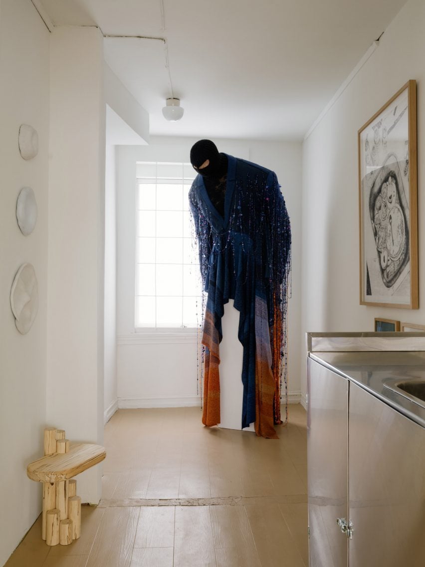 Clothed figure in D142 concept store and galery in Oslo