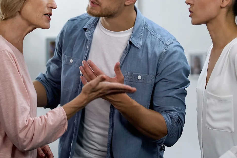 Getty Images Stock photo of mother-in-law arguing with couple