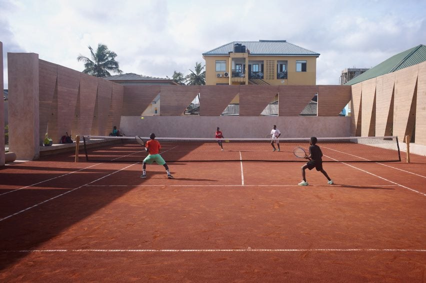 Children playing tennis at Backyard Community Club