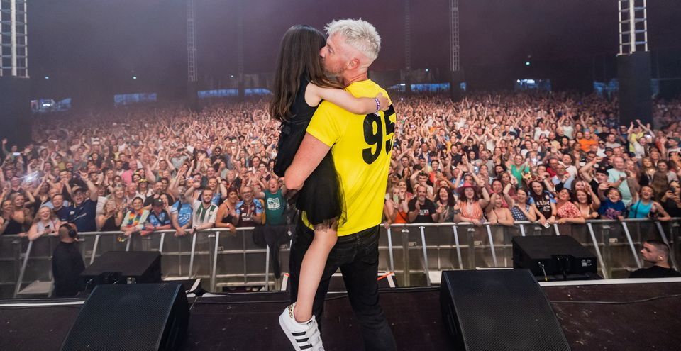 Dec Pierce on stage at Fairview Park with his daughter