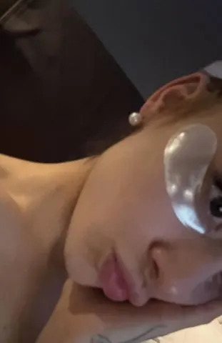 Ariana Grande/Instagram Ariana Grande shares selfie while wearing an under-eye mask